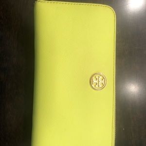 Wallet, kinda of a neon yellow with blue lining
